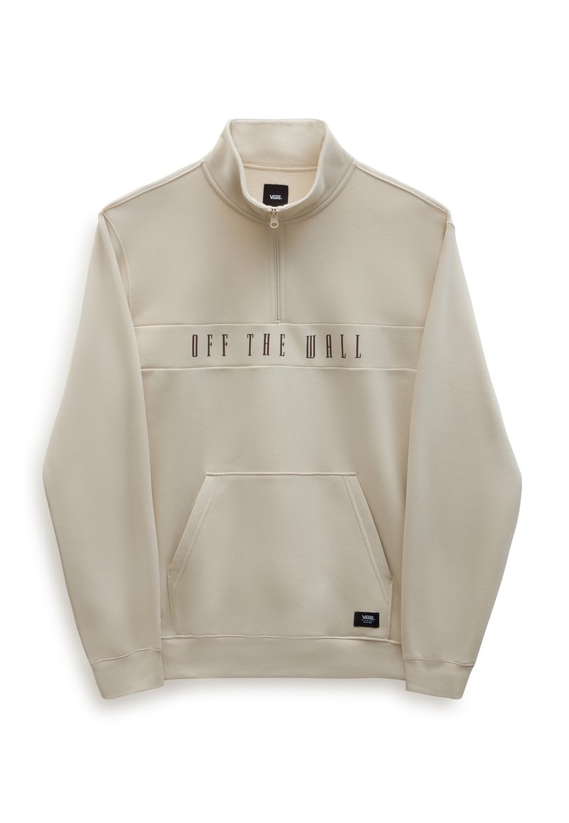 Felpa beige con colletto a mezza zip, tasca frontale e testo "OFF THE WALL" in marrone scuro sulla parte anteriore. Texture liscia, design casual.