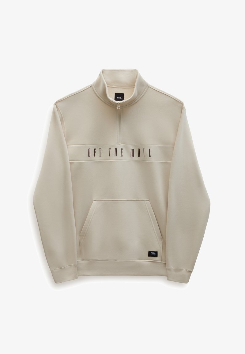 Sweat-shirt beige avec un col zippé à moitié, poche avant et texte "OFF THE WALL" en marron foncé sur la poitrine. Texture lisse, design décontracté.