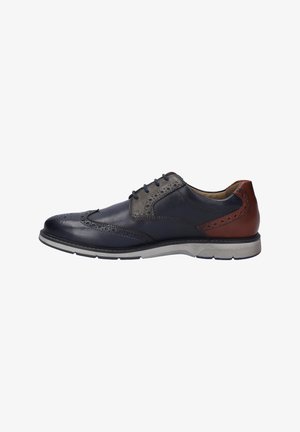 Leren dresschoen in donker marineblauw met een lichtgrijze zool; beschikt over brogue-details en bruine accenten op de hak en zijkant.