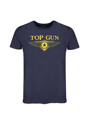 Marineblaues Baumwoll-T-Shirt mit dem Schriftzug "TOP GUN" in kräftigem Gelb, verziert mit einem geflügelten Emblem und einem zentralen Stern. Kurze Ärmel.