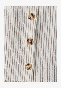 Wybrany, mocha stripe