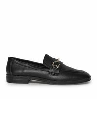 Black leather loafers with a low heel, featuring a decorative strap and metallic buckle. Smooth texture and classic design.