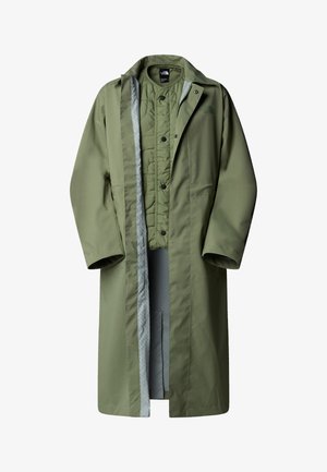 Olive green long coat with a zipper and snap closure. Features a quilted inner lining in gray and side pockets. Smooth, water-resistant fabric.