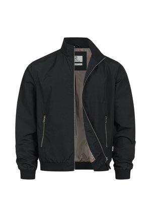 Zwarte jas met ritssluiting, opstaande kraag, twee zijzakken met rits, elastische manchetten en deels zichtbare beige voering.