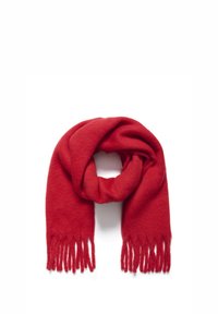 Red wool scarf with a soft texture, featuring fringe edges. It is coiled in a circular shape, providing warmth and coverage.