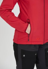 Whistler COVINA MIT ZWISCHENME - Regnjacka - rococco red