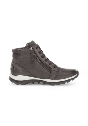 Gray ankle boots made of textured leather. Features laces, a side zipper, and a contrasting white sole with black tread.