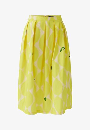 Yellow midi skirt with pleats and a lemon pattern featuring green leaves on a white background.
