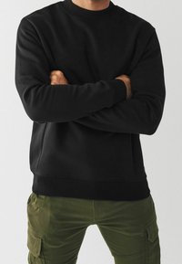 Next Sudadera - black