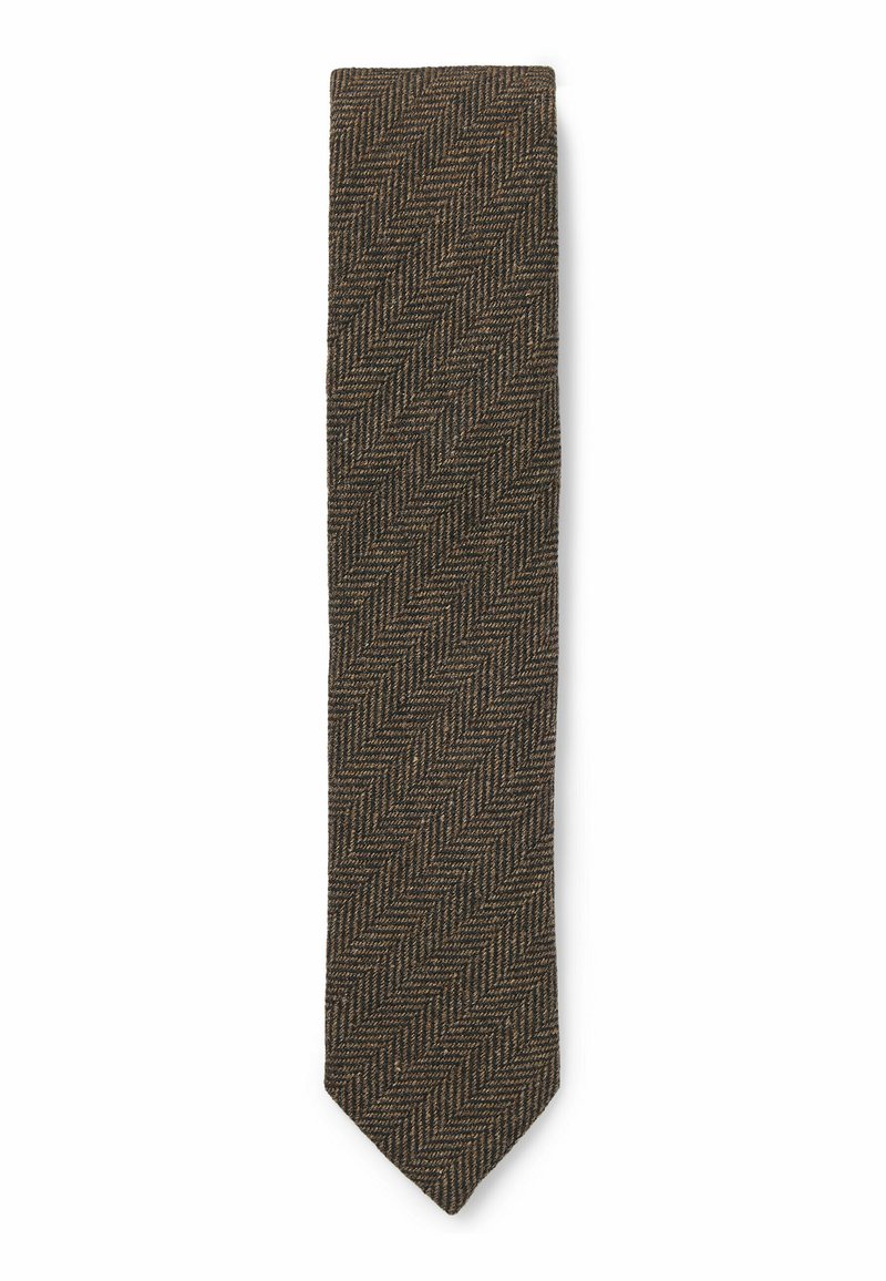 Brown herringbone tie made from textured fabric with a narrow shape, featuring a pointed tip and intricate woven pattern.