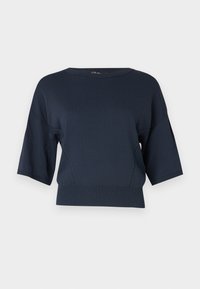 Marinblå kortärmad topp tillverkad av en mjuk trikå. Har rund halsringning och ribbad nederkant med sidodetaljer.