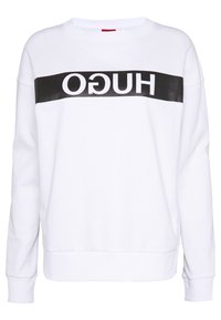 Bílá mikina s černým vodorovným pruhem a nápisem "HUGO". Měkký bavlněný materiál, kulatý výstřih a žebrované manžety a lem.