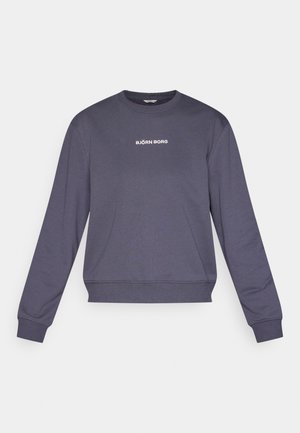 Grå genser med rund hals og lange ermer. Har en hvit "BJÖRN BORG"-logo på brystet. Laget av mykt, teksturert stoff.