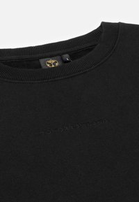 Zwarte sweatshirt van katoenmix met geribbelde ronde hals. Voorzien van reliëftekst "TOMORROWLAND" op de voorkant en gouden logo-label aan de binnenkant van de kraag.