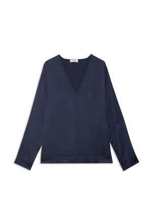 Dark navy silk blouse with long sleeves and a deep V-neck. Features a relaxed fit and smooth texture, minimal stitching details.