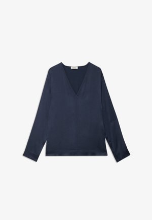 Dark navy silk blouse with long sleeves and a deep V-neck. Features a relaxed fit and smooth texture, minimal stitching details.
