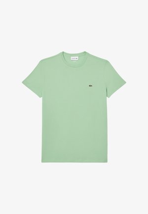 Maglietta a maniche corte verde chiaro realizzata in morbido cotone con scollatura rotonda. Presenta un piccolo logo scuro sul lato sinistro del petto.