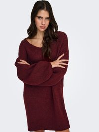 Jersey burdeos de punto oversize con escote ancho, textura acanalada y mangas largas y sueltas, que llega hasta la mitad del muslo.