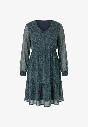 Ciemnozielona sukienka z długim rękawem, dekoltem w serek, taliowana, z lekko rozszerzaną, warstwową spódnicą z delikatnym białym wzorem w kropki.