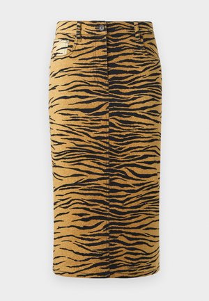 Tiigri triibuline seelik, millel on kuldne taust ja mustad mustrid. Valmistatud denimist, sirge lõikega ja sisaldab taskuid.