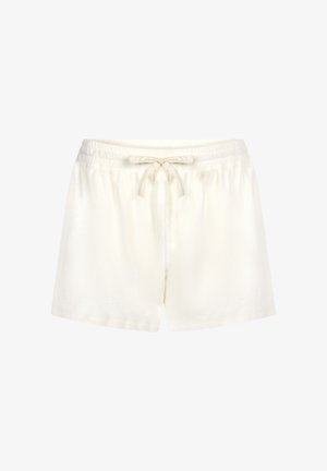 Crème-kleurige shorts gemaakt van zachte stof. Voorzien van een elastische tailleband met een koord en een losse pasvorm met rechte pijpen.