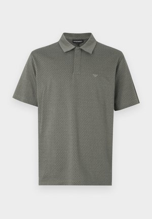 Short-sleeve polo shirt in dark green featuring a textured geometric pattern, collared neckline, and subtle logo embroidered on the chest.