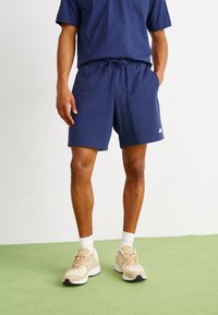 New Balance - SPORT ESSENTIALS - Tracksuit bottoms - navy Thumbnail Image 1