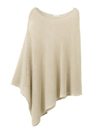 Poncho beige en tricot avec un ourlet asymétrique et un motif en maille ajourée, conçu pour une coupe ample et drapée.