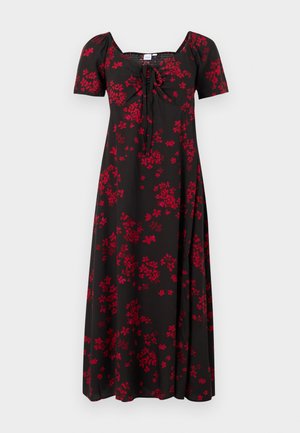 Robe midi noire avec manches courtes bouffantes, imprimé floral rouge, buste froncé avec détail noué et encolure carrée.