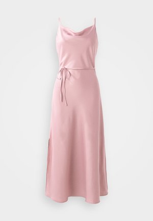 Pink satin dress with a cowl neckline, thin straps, and a tie belt at the waist. Features a side slit for ease of movement.