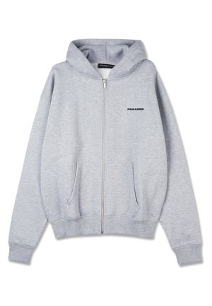 Hoodie gris zippé en tissu doux et bouclé. Il dispose d'une poche kangourou et de poignets côtelés. Sur le devant, un petit logo noir se trouve sur la poitrine gauche.