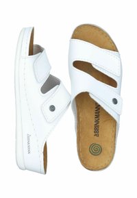 White leather sandals with two adjustable straps, open toe design, and a cushioned insole. Features circular logo and stitched detailing.