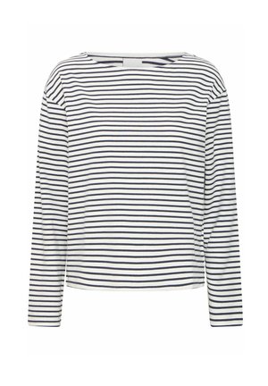 Dugulja s dugim rukavima s brodskim izrezom, izrađena od mekog materijala s tamnoplavim i bijelim horizontalnim prugama. Ravnog kroja i minimalnih detalja.