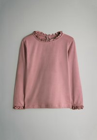 Dlhý rukáv top v práškovorožovej farbe s volánovým golierom a manžetami, zapínanie na gombíky na zadnom výstrihu, hladká látka.