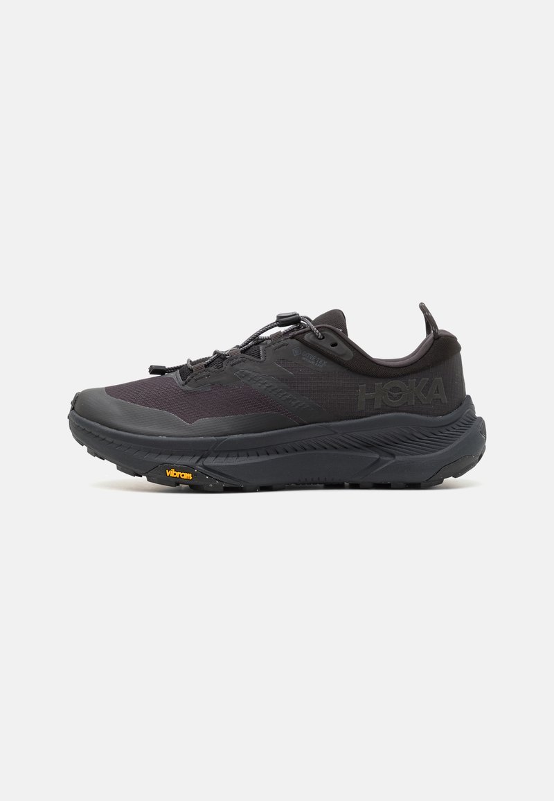 HOKA - TRANSPORT GTX - Hiking shoes - black, Enlarge