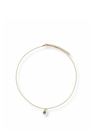 Thin gold necklace with a small blue and gold flower pendant and an adjustable chain clasp on a white background.