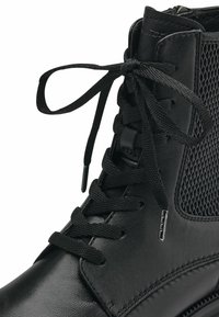 Tamaris Botines con plataforma - black