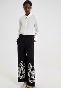 Touché Privé - EMBROIDERED - Trousers - black Thumbnail Image 1