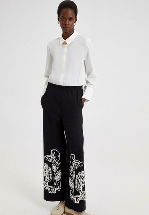 EMBROIDERED - Broek - black