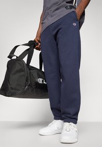 Champion ICONS CUFF PANTS - Treningo apatinė dalis - navy