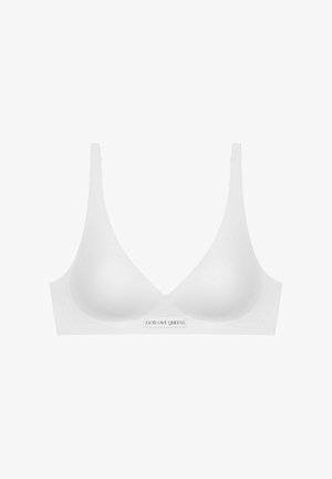 Weißer bügelloser BH mit glattem Stoff, tiefem V-Ausschnitt und breiten Trägern. Mit einem kleinen Etikett mit "GOD SAVE QUEENS" in der Mitte.