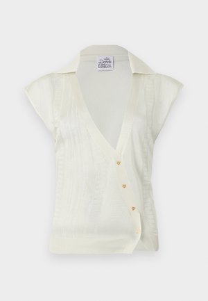 Haut en maille sans manches crème avec col en V, petit col, rayures verticales texturées et quatre petits boutons floraux dorés sur le devant.