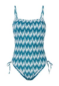 Mėlynos spalvos vientisas maudymosi kostiumėlis su baltu zigzago raštu, reguliuojamomis petnešomis ir šoninėmis raištelėmis pritaikymui. Minkšta tekstilės medžiaga.
