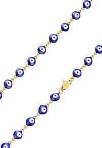 Zlatý náhrdelník z reťaze s modrými korálkami a detailom bieleho oka v strede, hladký povrch a zapínanie na okolo.