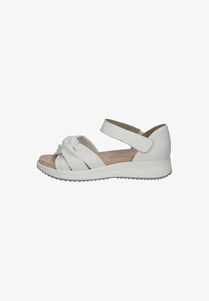 White leather sandals with a knotted front design, adjustable strap, cushioned insole, and lightweight rubber sole featuring a textured grip.
