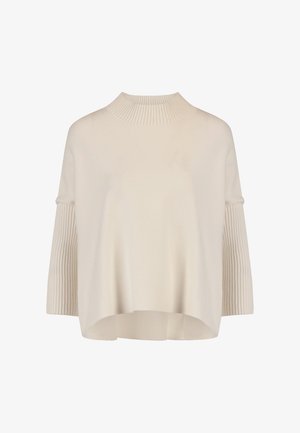 Cremefarvet løstsiddende sweater med ribbet høj hals og ribbede ærmer i mellemlængde, der har en let buet kant.