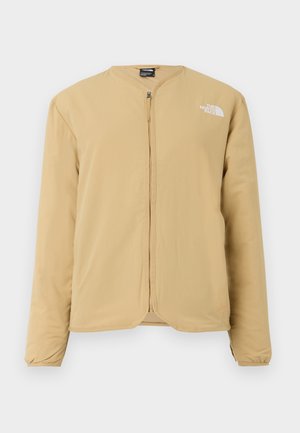 Beige leichte Jacke mit rundem Kragen, vollem Reißverschluss und Logo auf der linken Brust. Glatte Textur und lange Ärmel.