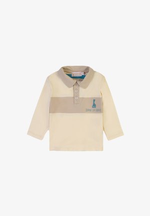 Long-sleeve polo shirt in light yellow with a beige stripe. Features buttons and embroidered turquoise giraffe logo. Soft cotton material.