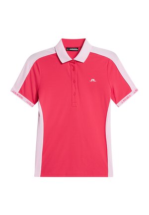 Vaaleanpunainen poolopaita, jossa on valkoiset yksityiskohdat, lyhyet hihat, kolmonen napitus ja brändilogo rinnassa. Valmistettu kevyestä ja sileästä kankaasta.