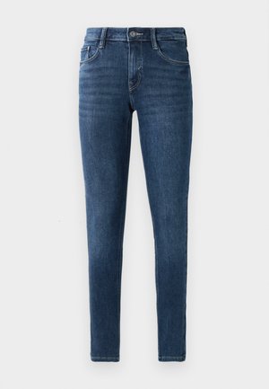 Mörkblå skinny jeans i denim med klassisk femficksdesign, framknäppning och subtila stickdetaljer. Slät textur genom hela plagget.